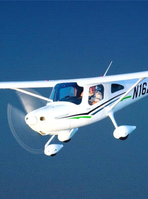 small aircraft with pilot landing for an aircraft appraiser